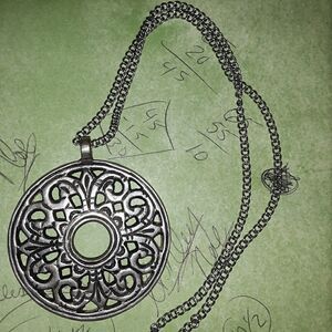Stainless steel necklace with a large round pendan